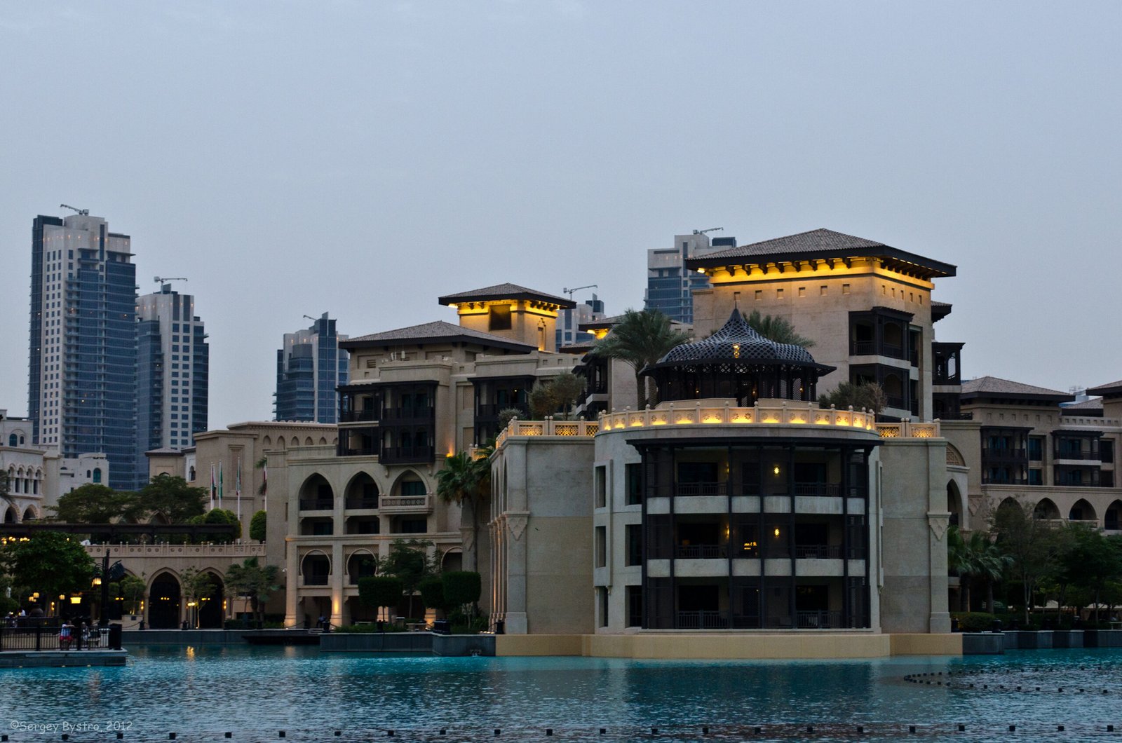 Palace Downtown seen across Burj Lake, with the Burj Khalifa behind it